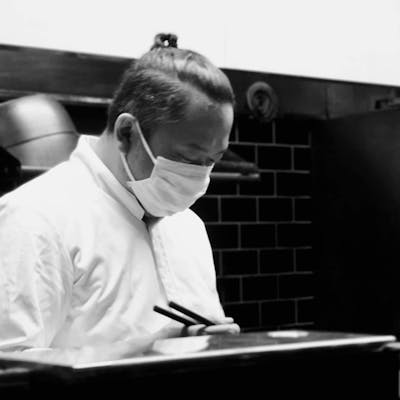 店主 金子 辰之