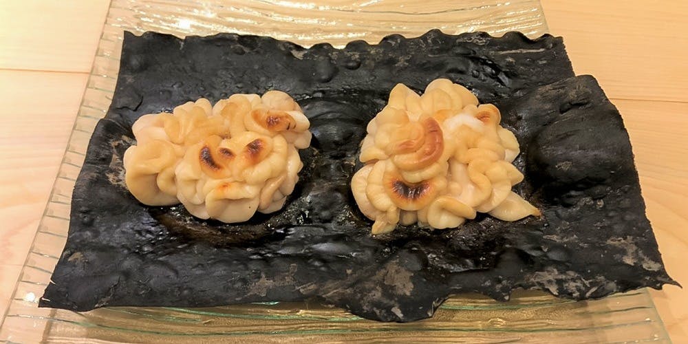 とみずし
