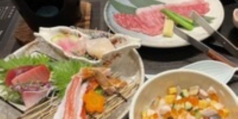 蟹刺し入りお造りと特選牛サーロイン溶岩焼コース