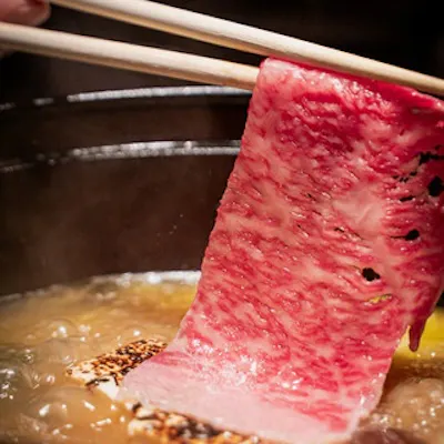 黄金スープで味わう鶏炊き鍋